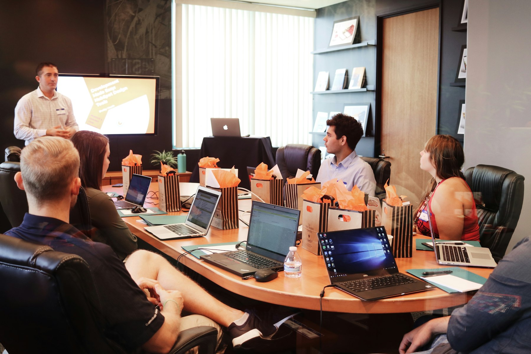 Finance and accounting professionals collaborating in a modern conference room