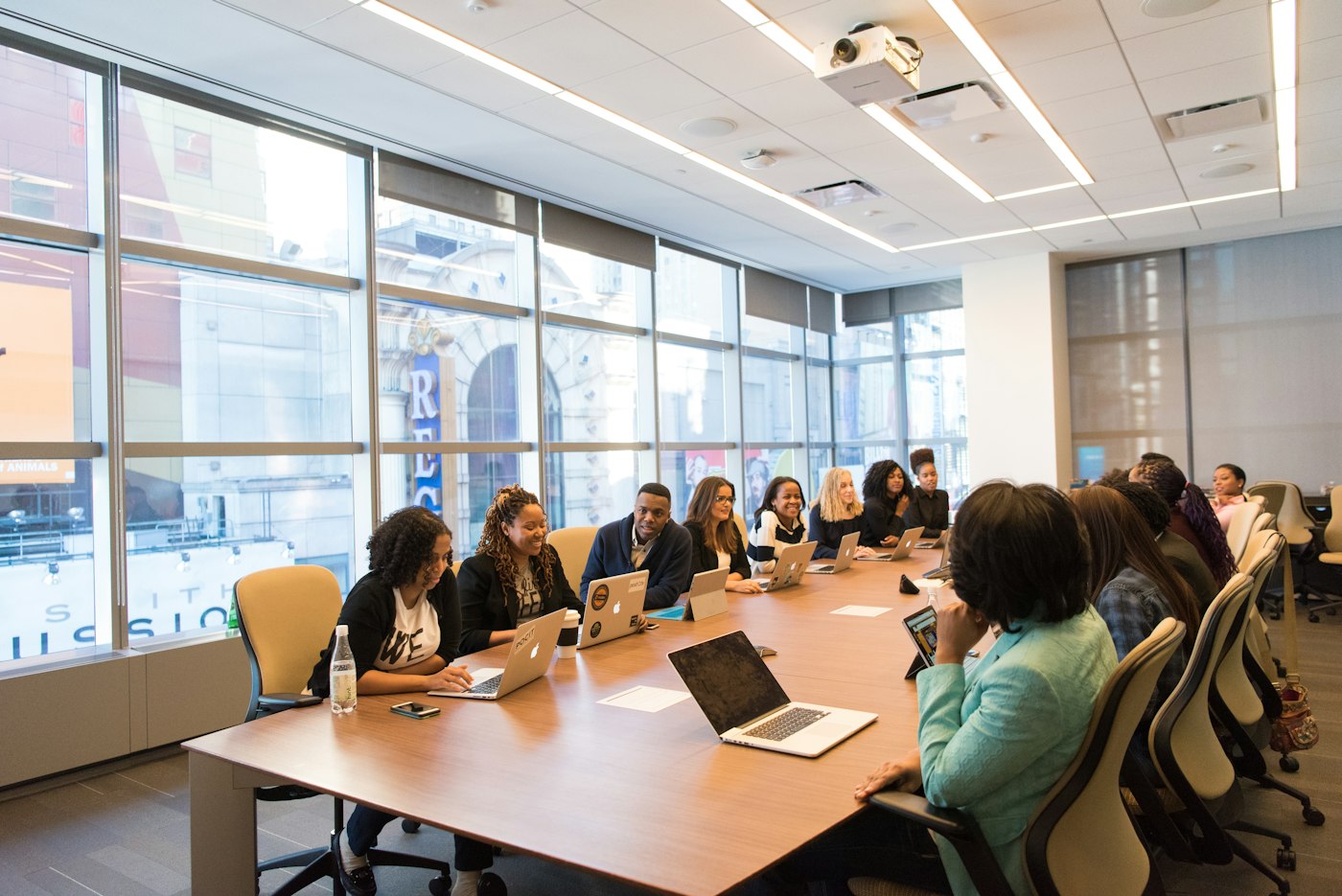 Accounting and operations professionals collaborating around a conference table